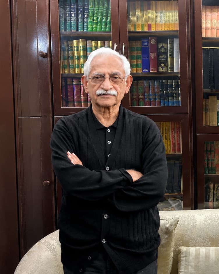 Portrait of Dr. Badr Hashemi in his library
